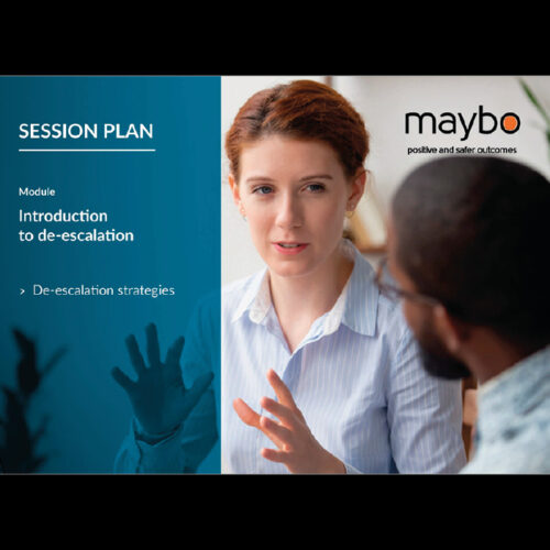 A woman engaged in a discussion about de-escalation strategies, with a focus on effective communication techniques.