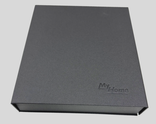 A grey rectangular box with the text "MyHome" embossed on the top surface.